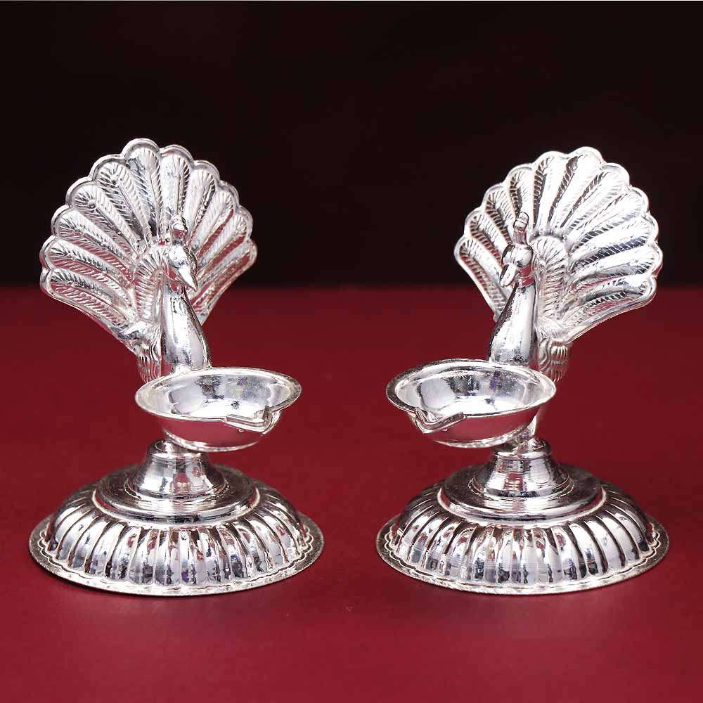 Kamakshi Silver lamp- Pure silver gift items- Silver Pooja Items for Home,  Return Gift for Navarathri, Wedding and Housewarming | Silver gifts, Silver  pooja items, Gold jewels design