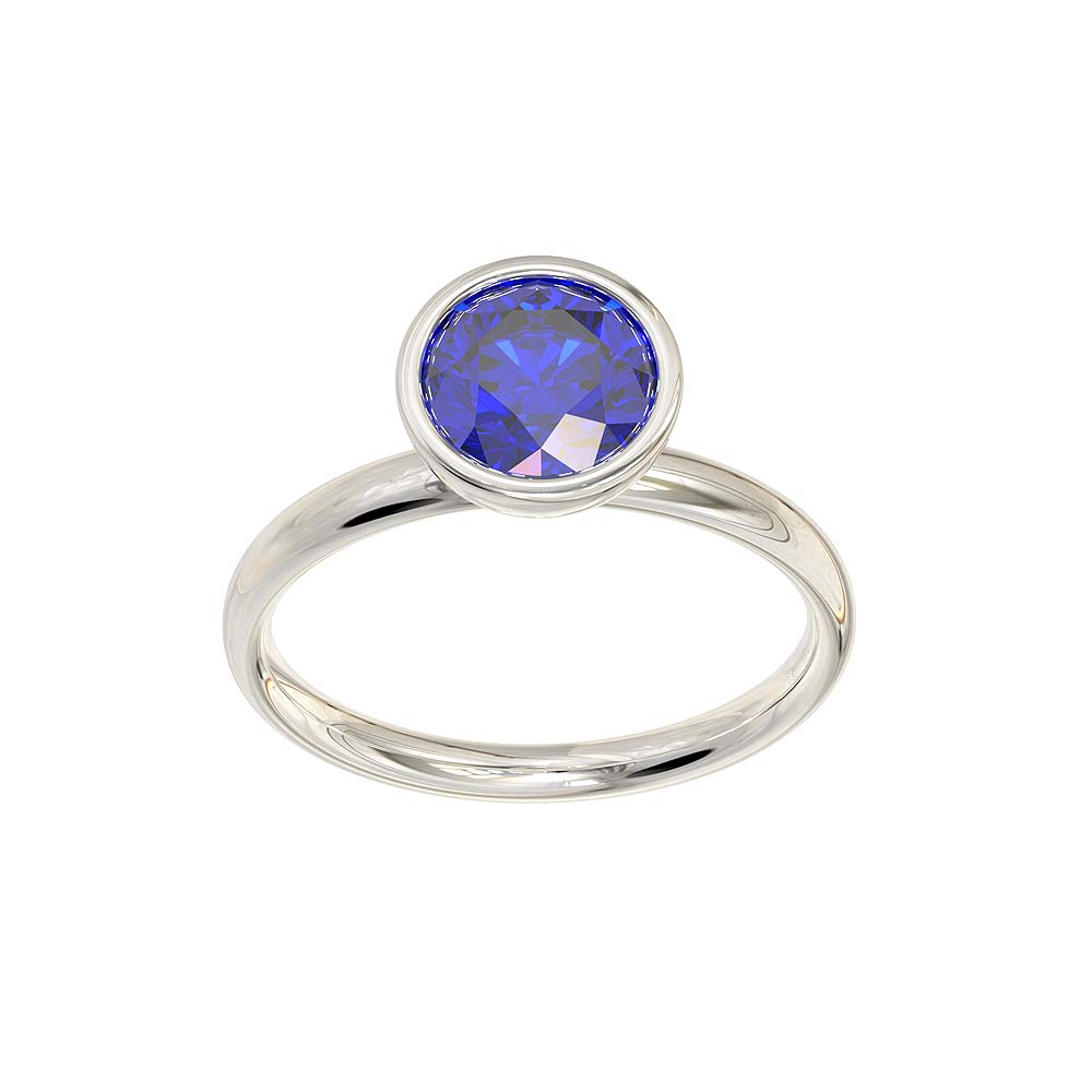 Drop shaped sapphire blue stone ring in platinum and cz -